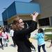 Carpenter Elementary school media specialist Sharyl Burau claps as students march into the school during a 175th birthday celebration on Friday, April 26, 2013. Melanie Maxwell I AnnArbor.com